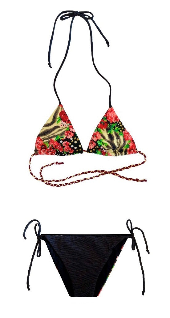 Bikini triangular estampado de flores y topos. Braguita triangular de piqué negro por delante y estampada por detrás.